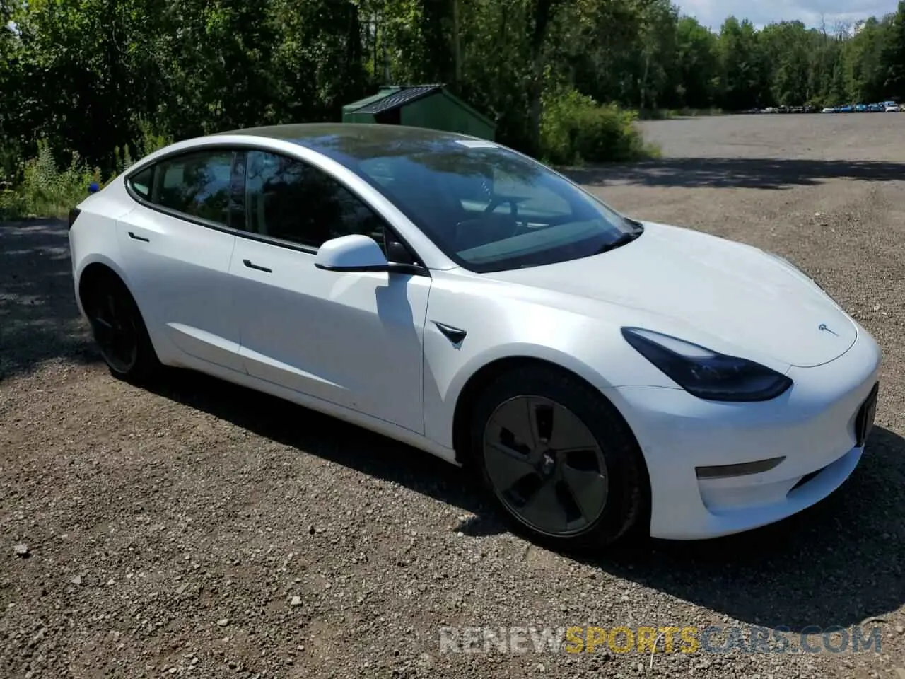 4 Photograph of a damaged car 5YJ3E1EA4NF340377 TESLA MODEL 3 2022