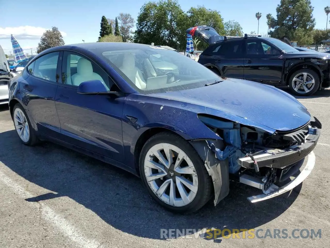 4 Photograph of a damaged car 5YJ3E1EA4NF361410 TESLA MODEL 3 2022
