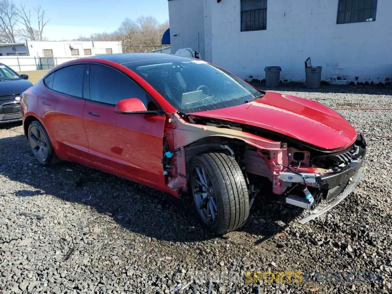 4 Photograph of a damaged car 5YJ3E1EA5NF184785 TESLA MODEL 3 2022