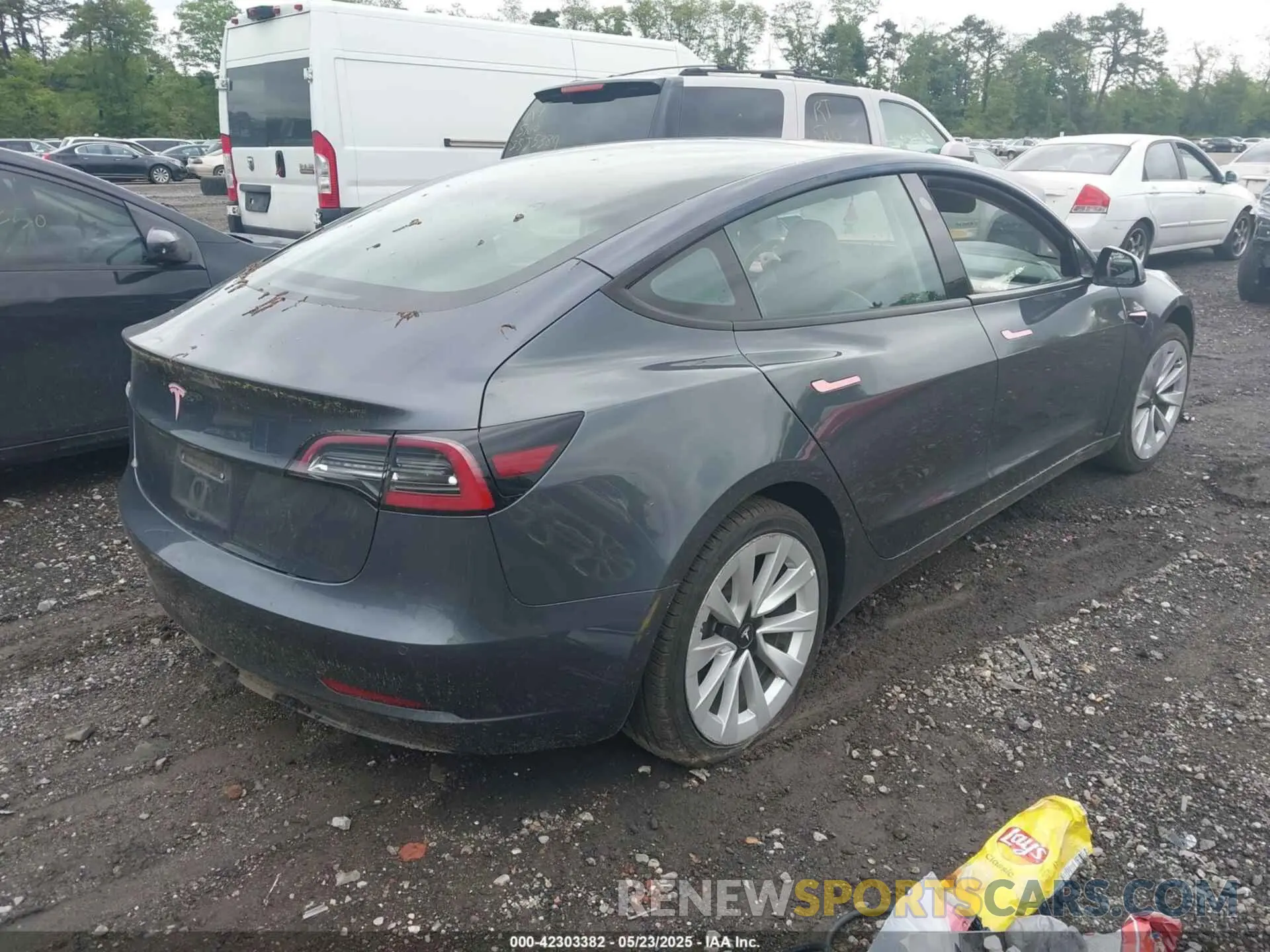 4 Фотография поврежденного автомобиля 5YJ3E1EA5NF185905 TESLA MODEL 3 2022
