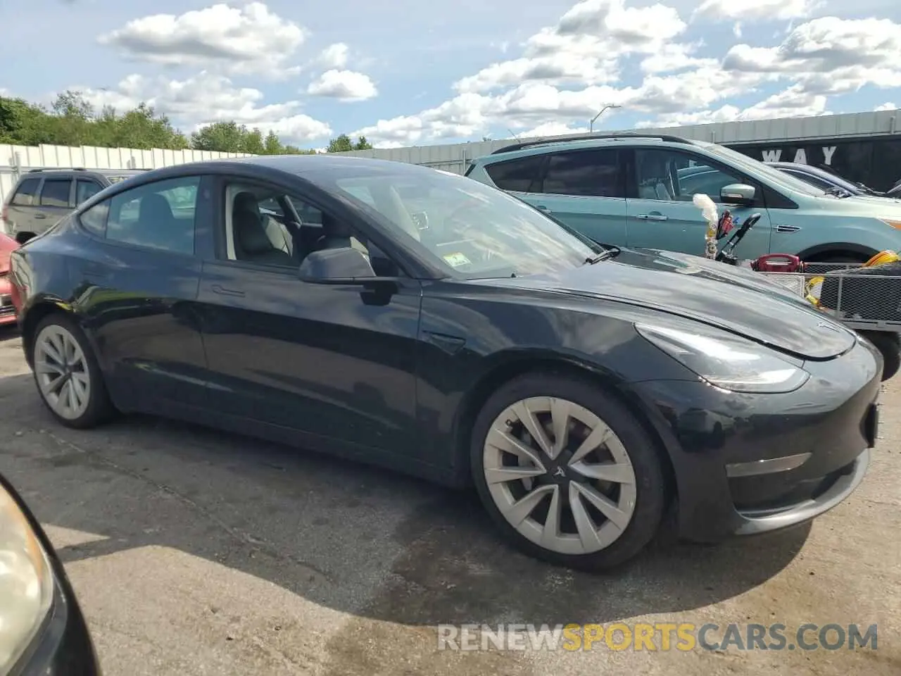 4 Photograph of a damaged car 5YJ3E1EA5NF186293 TESLA MODEL 3 2022