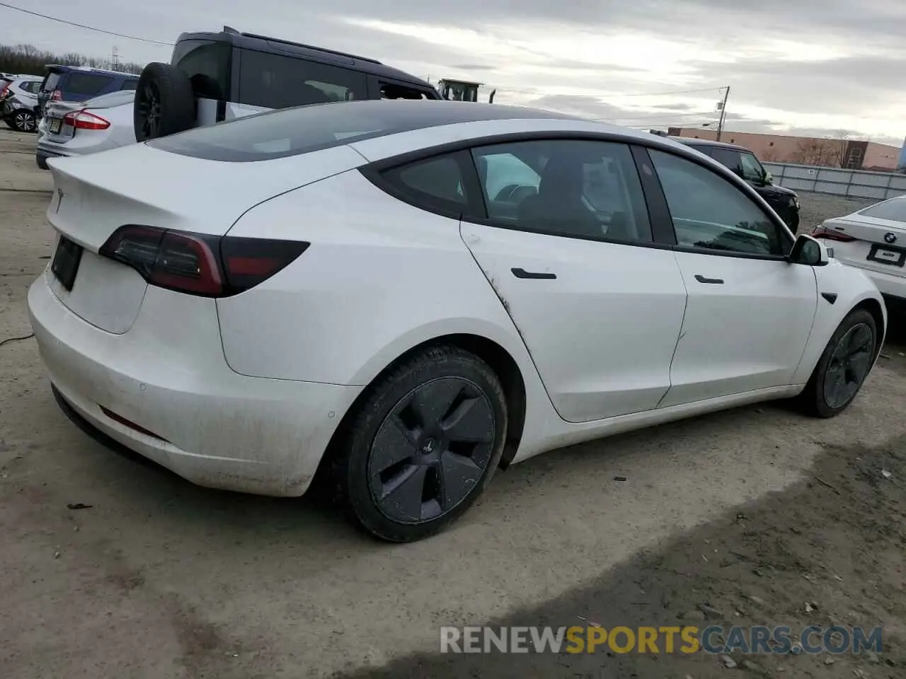 3 Photograph of a damaged car 5YJ3E1EA5NF324625 TESLA MODEL 3 2022