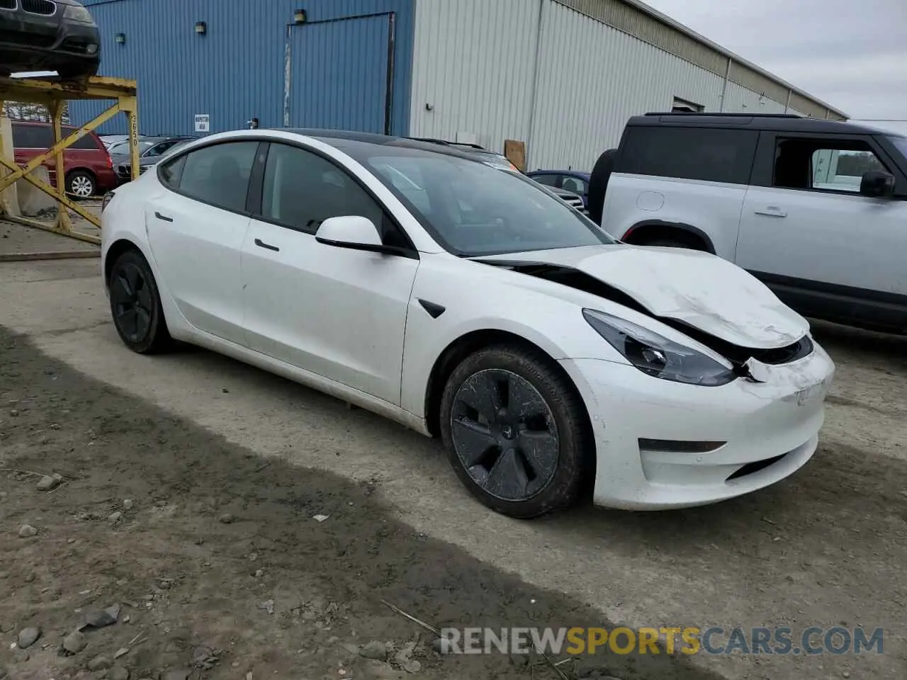 4 Photograph of a damaged car 5YJ3E1EA5NF324625 TESLA MODEL 3 2022
