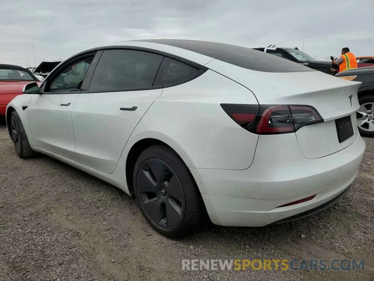 2 Photograph of a damaged car 5YJ3E1EA5NF327573 TESLA MODEL 3 2022