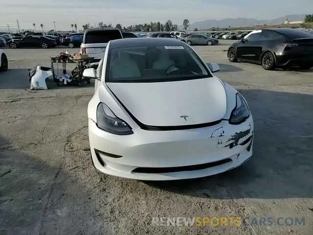 11 Photograph of a damaged car 5YJ3E1EA5NF360119 TESLA MODEL 3 2022