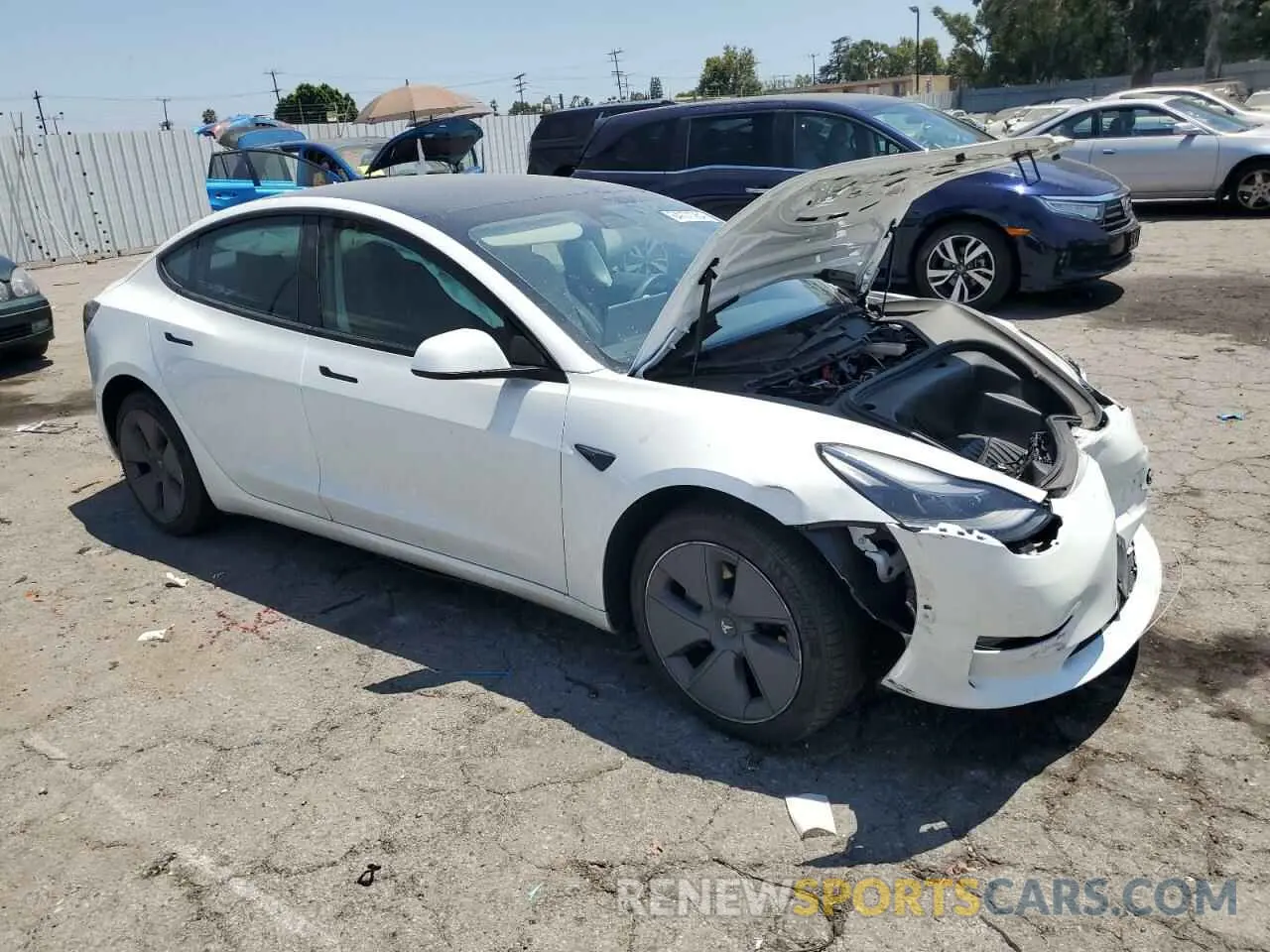 4 Фотография поврежденного автомобиля 5YJ3E1EA5NF375963 TESLA MODEL 3 2022