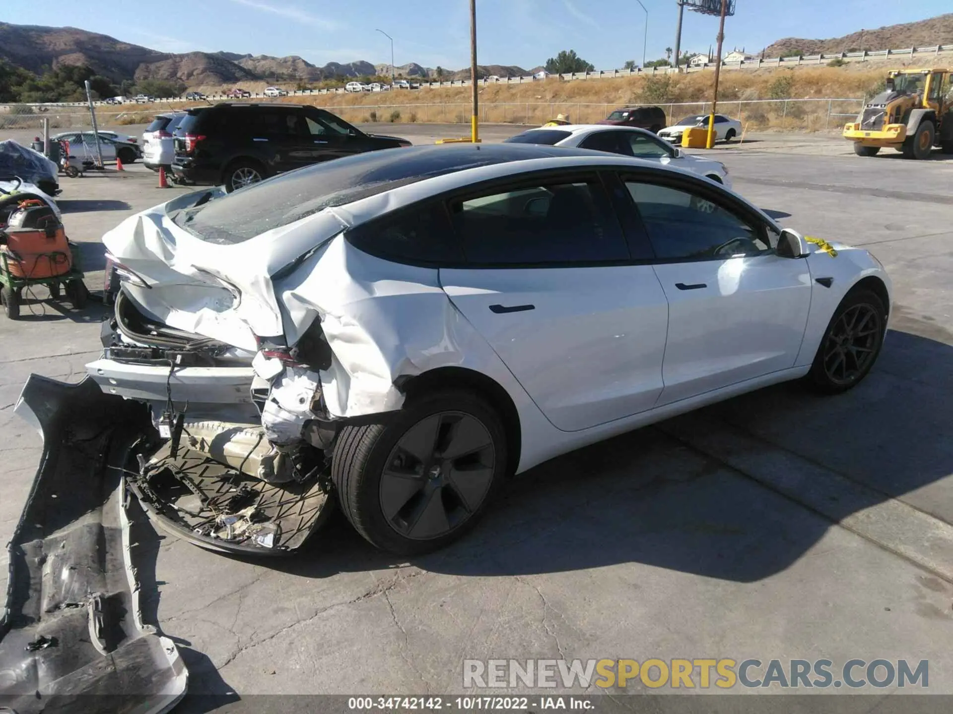 4 Photograph of a damaged car 5YJ3E1EA6NF322348 TESLA MODEL 3 2022