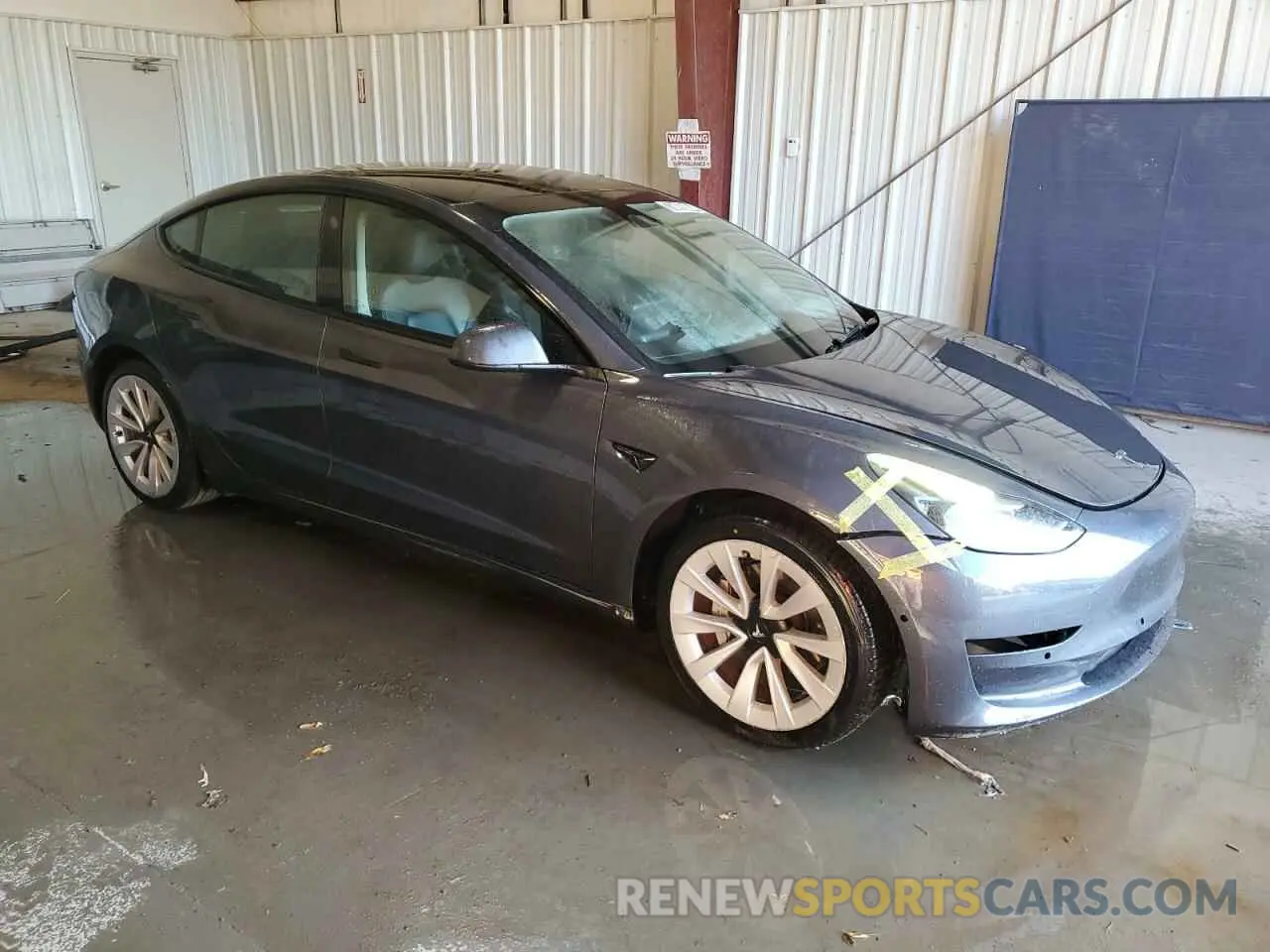 4 Photograph of a damaged car 5YJ3E1EA6NF371758 TESLA MODEL 3 2022