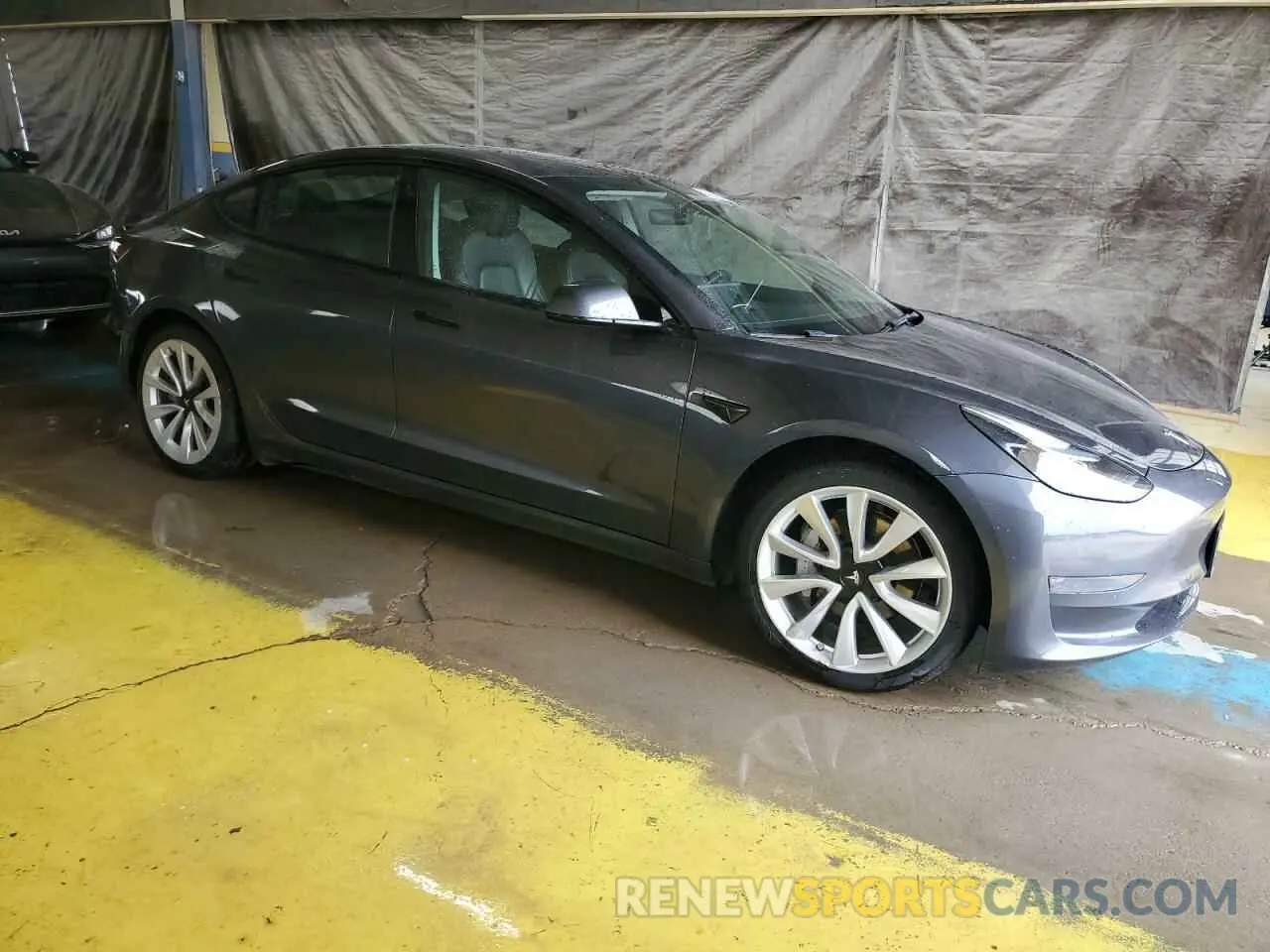 4 Фотография поврежденного автомобиля 5YJ3E1EA7NF189583 TESLA MODEL 3 2022
