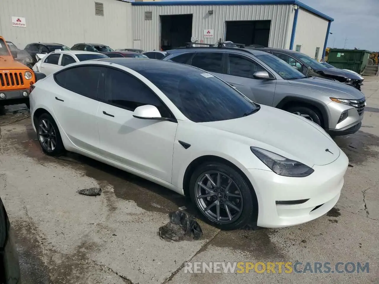 4 Фотография поврежденного автомобиля 5YJ3E1EA7NF314128 TESLA MODEL 3 2022