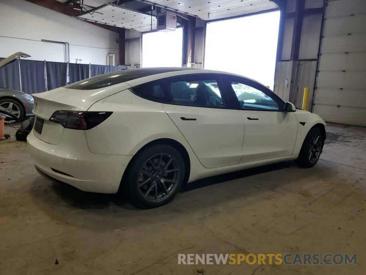 3 Photograph of a damaged car 5YJ3E1EA7NF322276 TESLA MODEL 3 2022