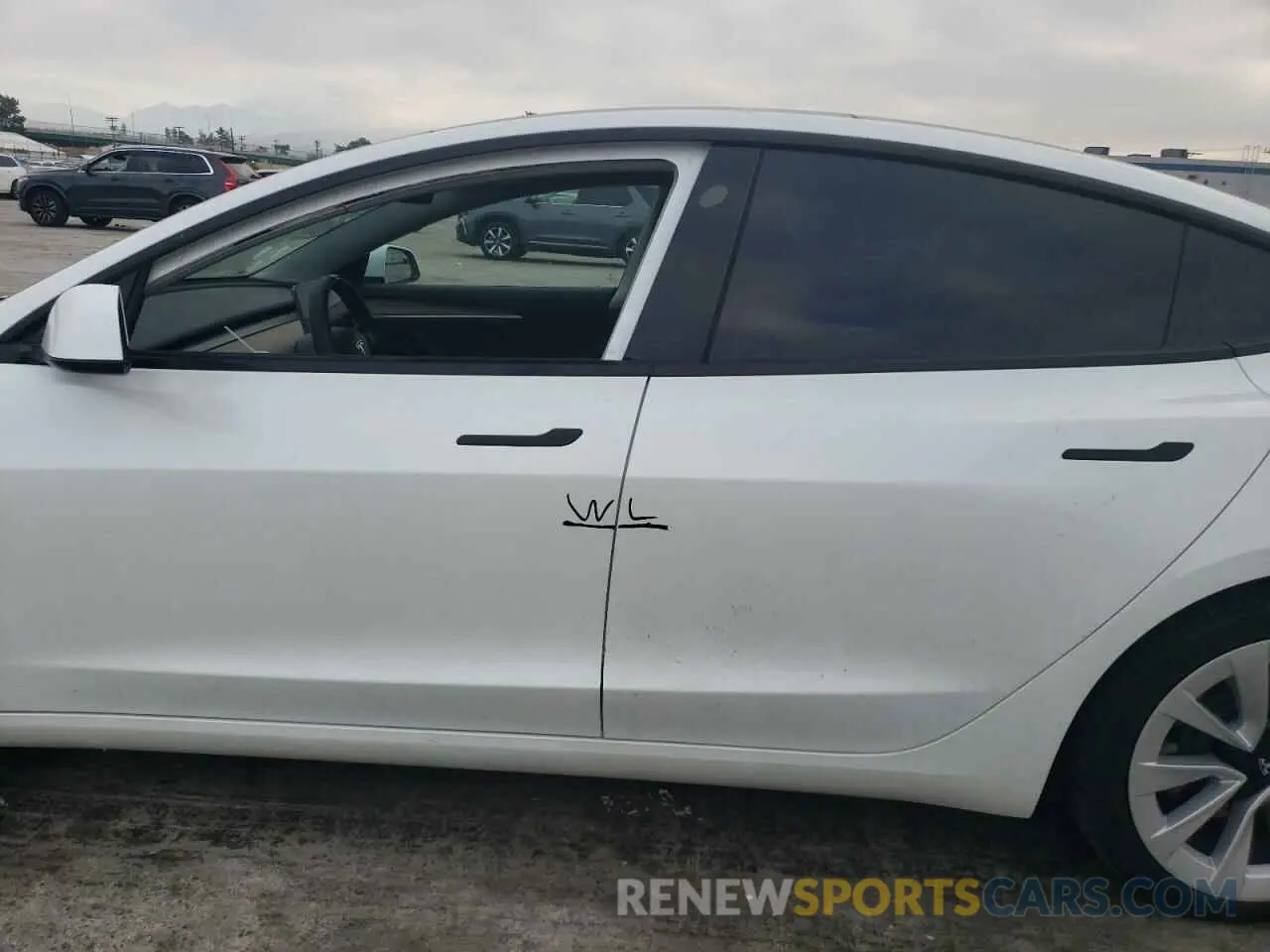 12 Photograph of a damaged car 5YJ3E1EA8NF174624 TESLA MODEL 3 2022