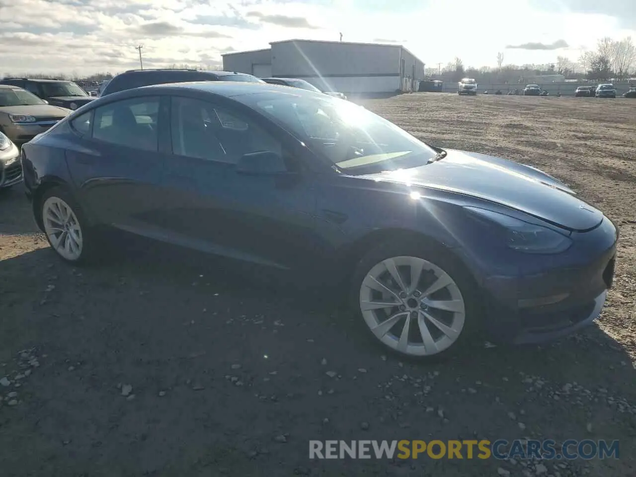 4 Photograph of a damaged car 5YJ3E1EA8NF186871 TESLA MODEL 3 2022