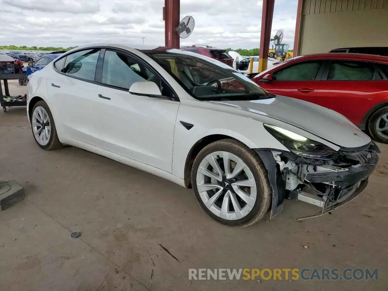 4 Photograph of a damaged car 5YJ3E1EA8NF187597 TESLA MODEL 3 2022