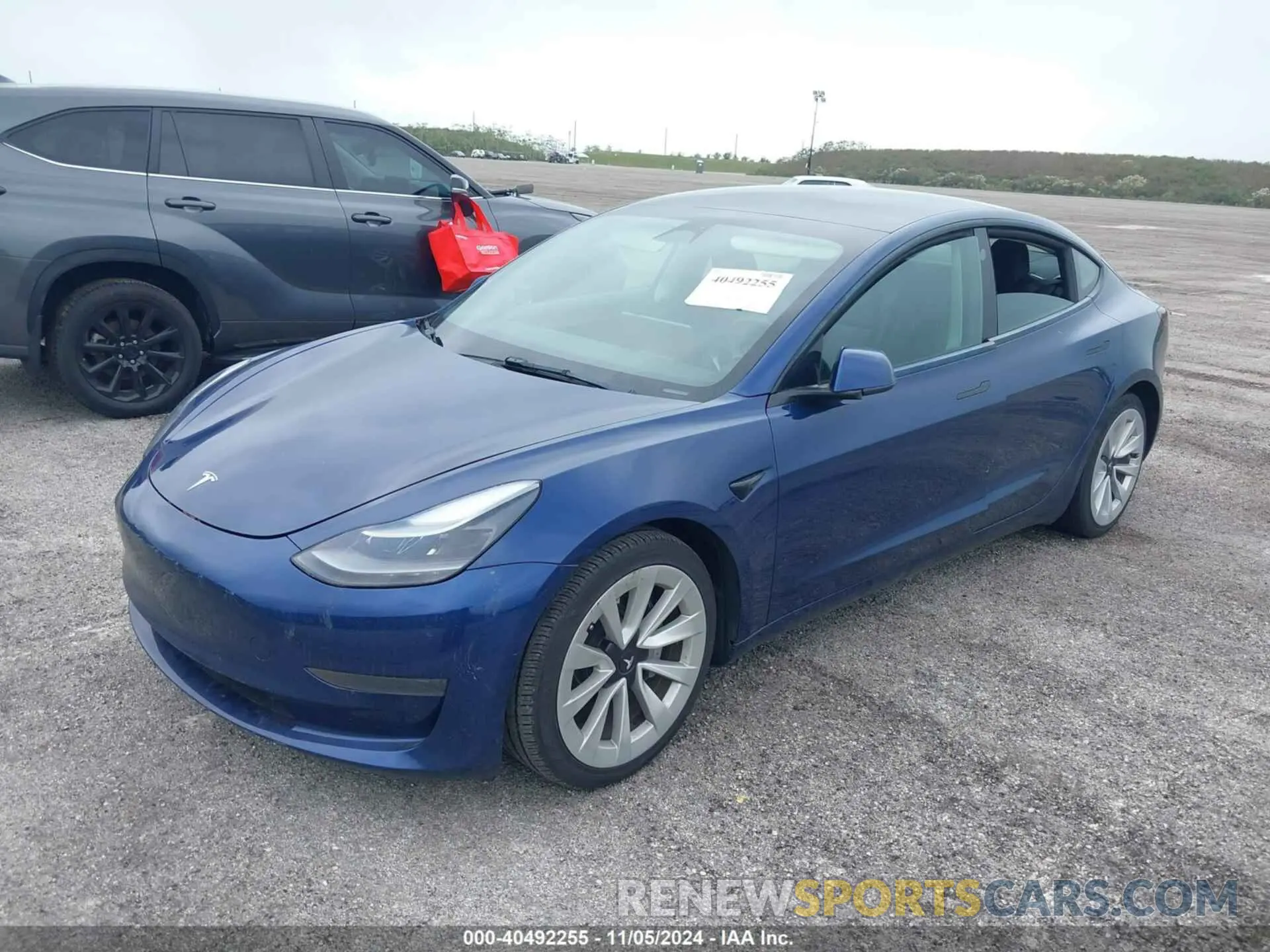 2 Photograph of a damaged car 5YJ3E1EA8NF192153 TESLA MODEL 3 2022