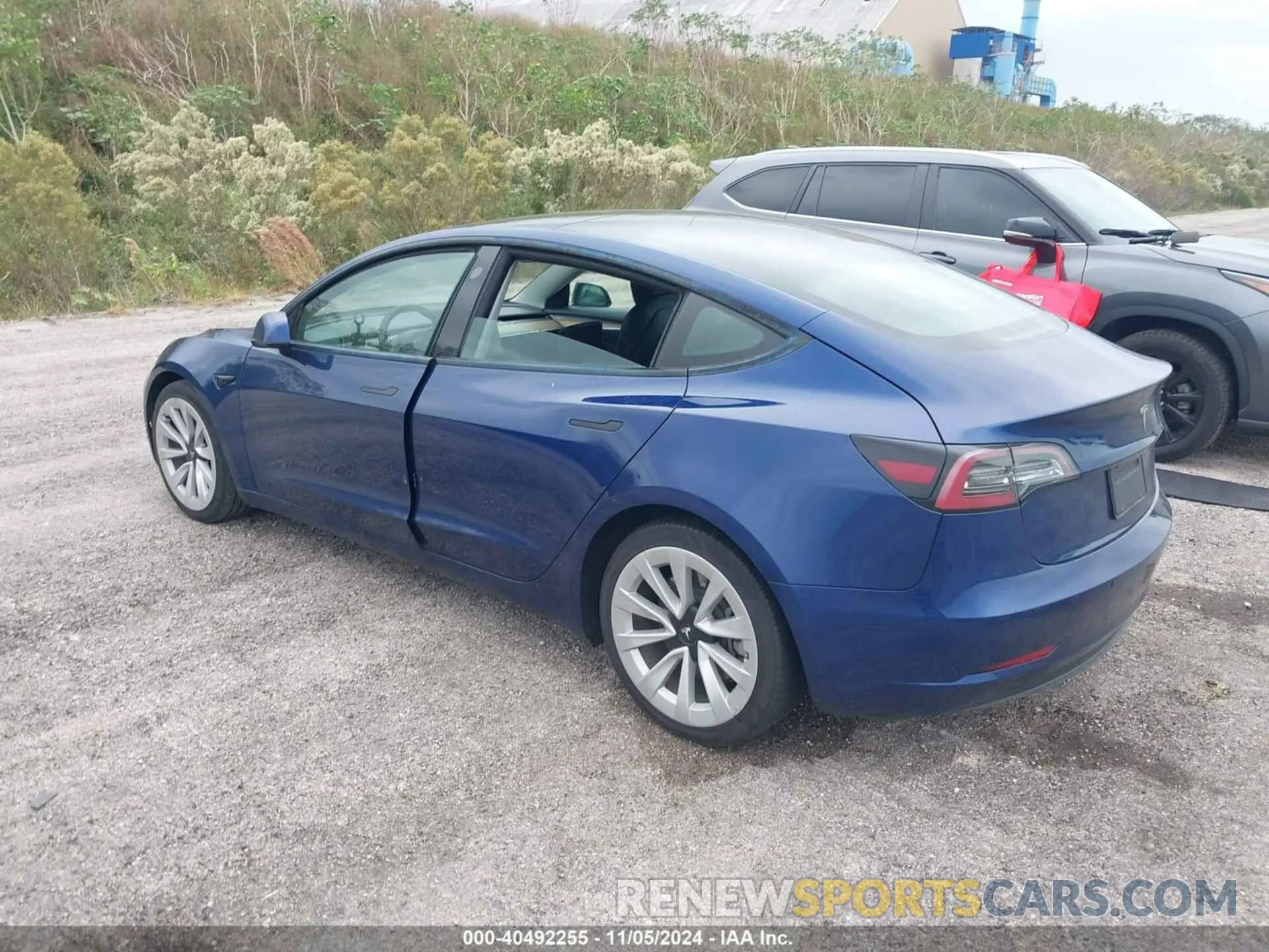 3 Photograph of a damaged car 5YJ3E1EA8NF192153 TESLA MODEL 3 2022
