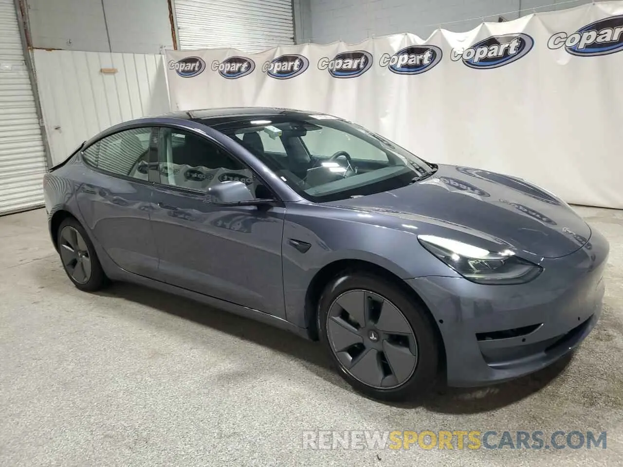 4 Photograph of a damaged car 5YJ3E1EA8NF287506 TESLA MODEL 3 2022