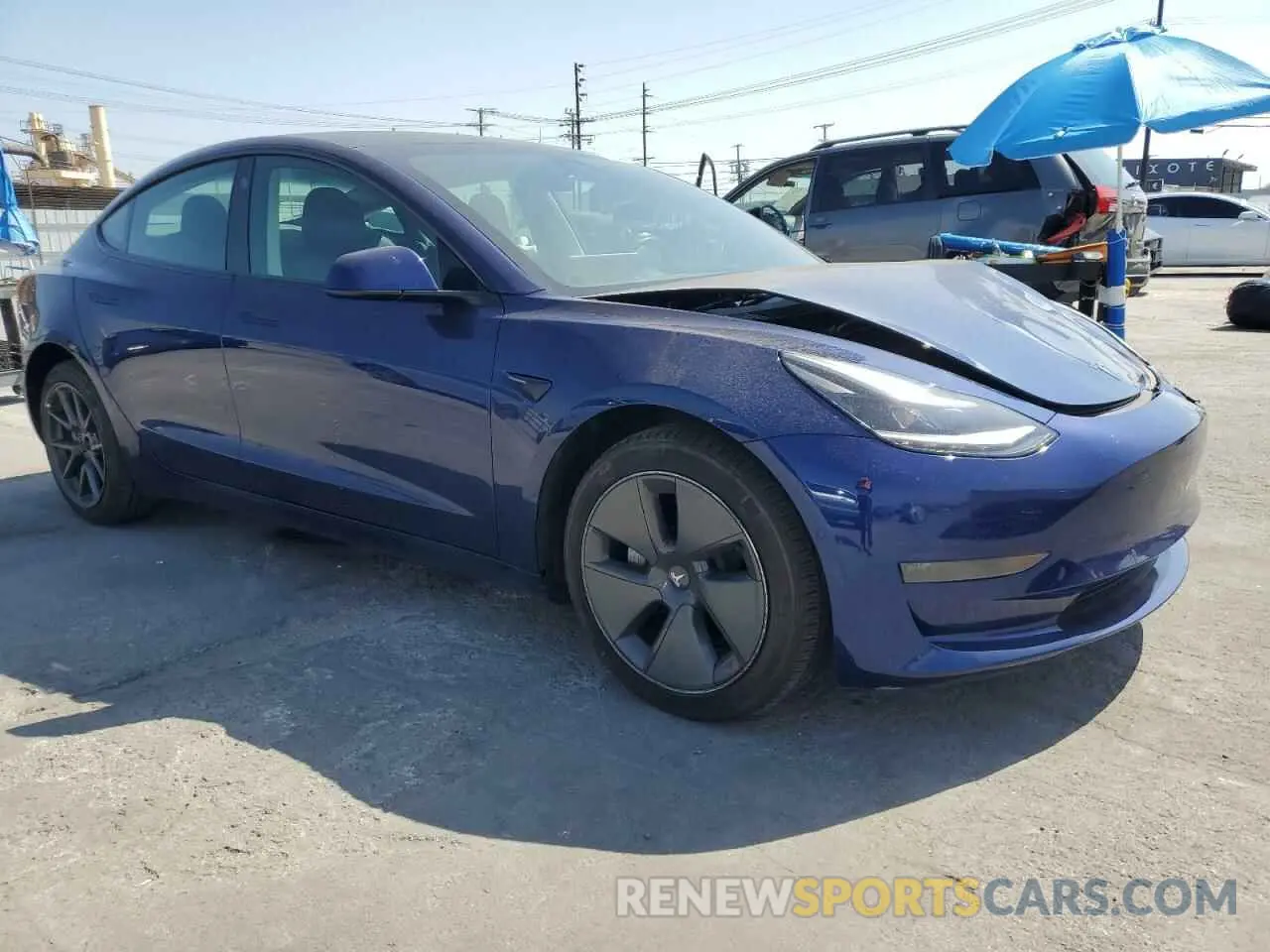 4 Photograph of a damaged car 5YJ3E1EA8NF331990 TESLA MODEL 3 2022