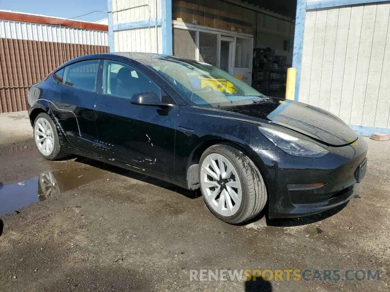 4 Photograph of a damaged car 5YJ3E1EA8NF372393 TESLA MODEL 3 2022