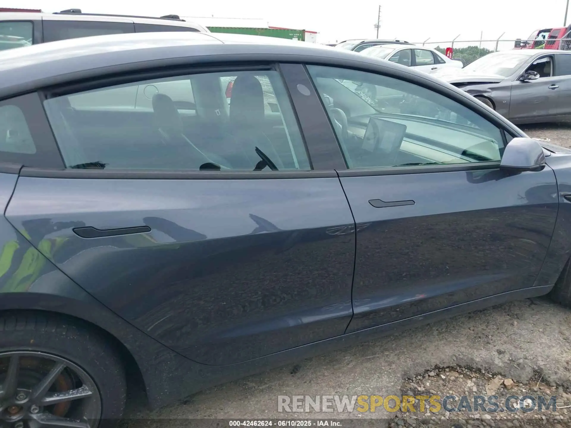 12 Photograph of a damaged car 5YJ3E1EA9NF108373 TESLA MODEL 3 2022