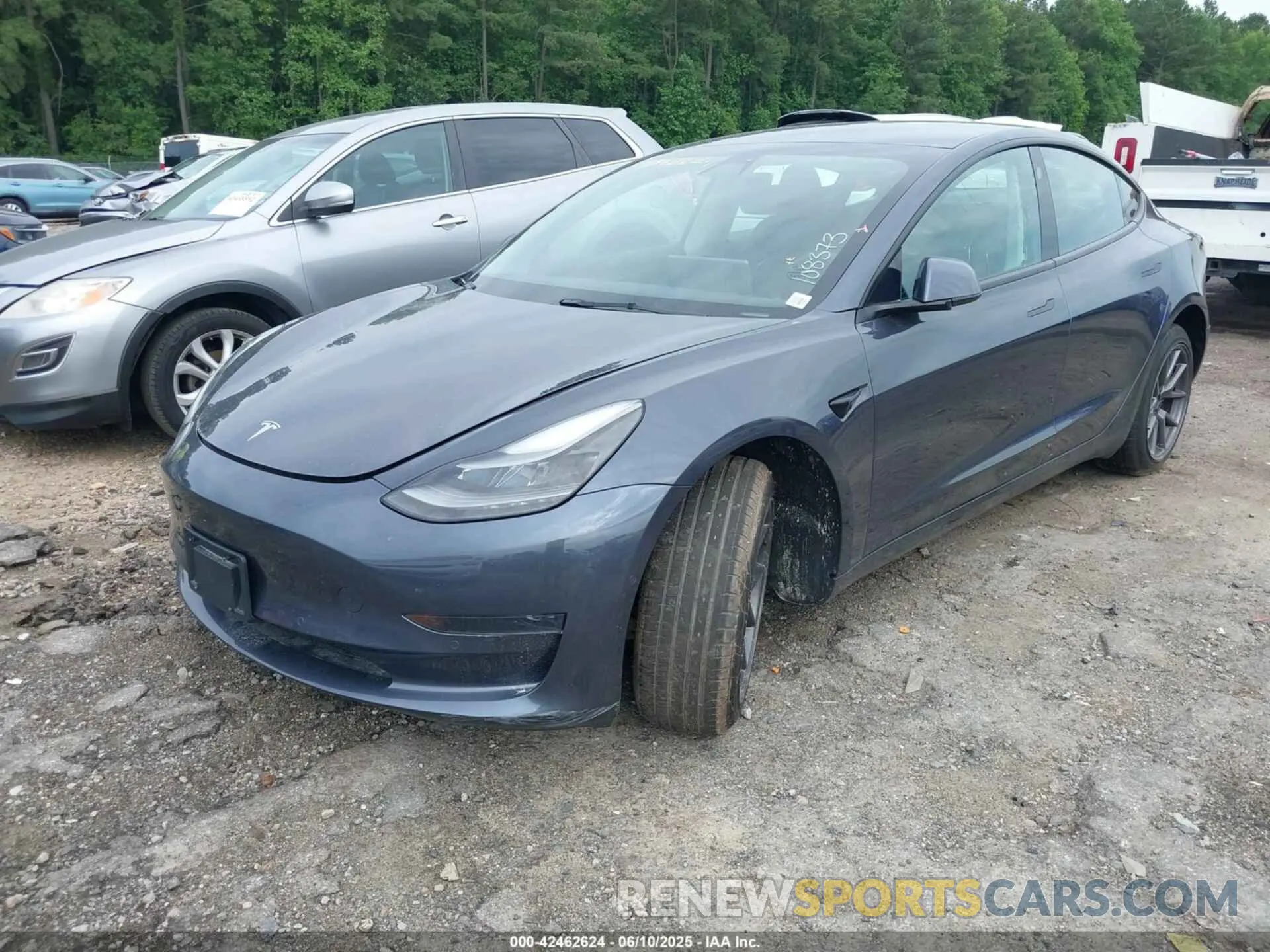 2 Photograph of a damaged car 5YJ3E1EA9NF108373 TESLA MODEL 3 2022