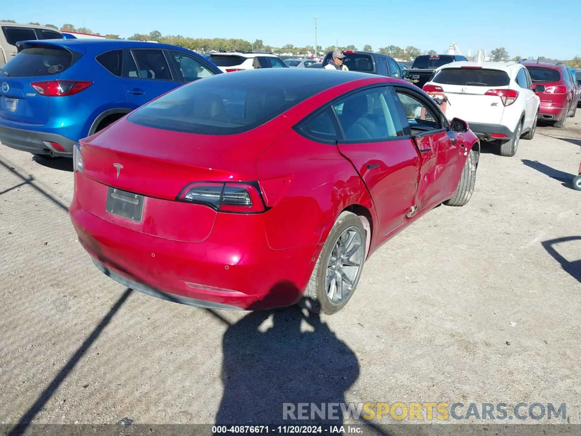 4 Photograph of a damaged car 5YJ3E1EA9NF311179 TESLA MODEL 3 2022