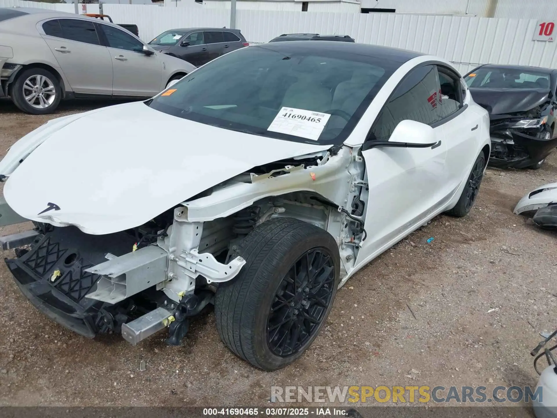 2 Photograph of a damaged car 5YJ3E1EA9NF337989 TESLA MODEL 3 2022
