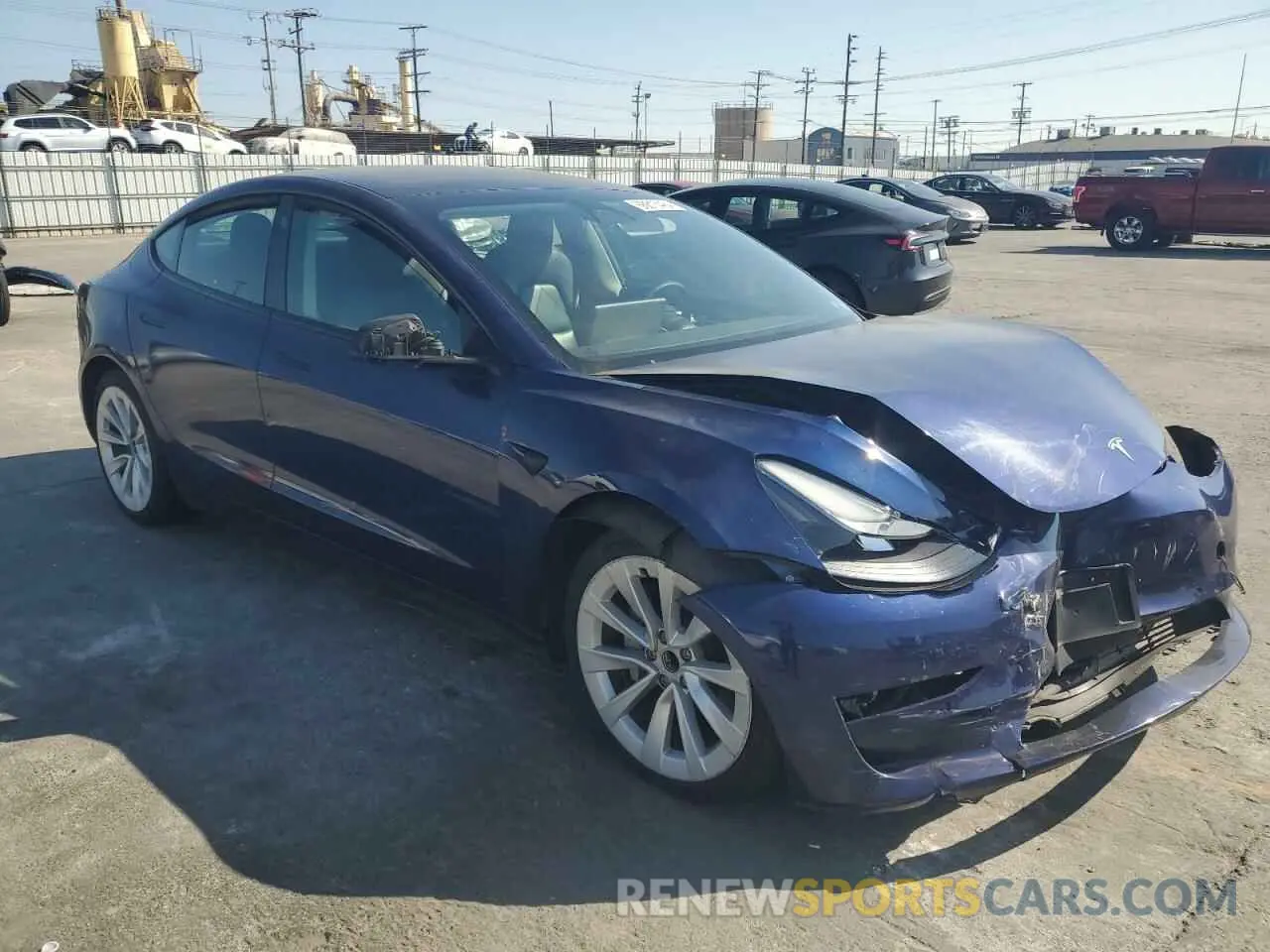 4 Photograph of a damaged car 5YJ3E1EAXNF142693 TESLA MODEL 3 2022
