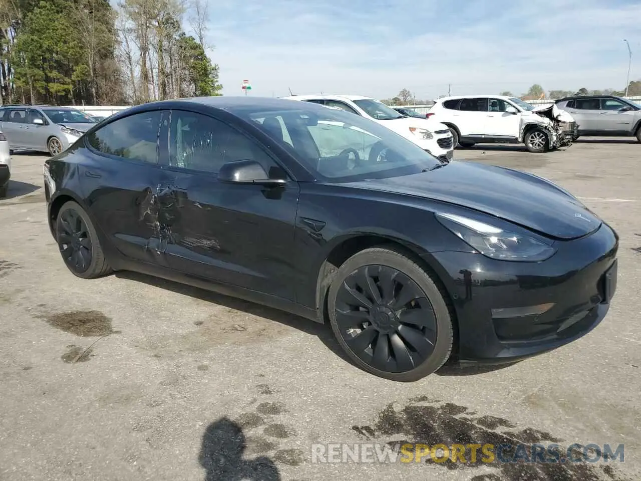 4 Фотография поврежденного автомобиля 5YJ3E1EAXNF185818 TESLA MODEL 3 2022