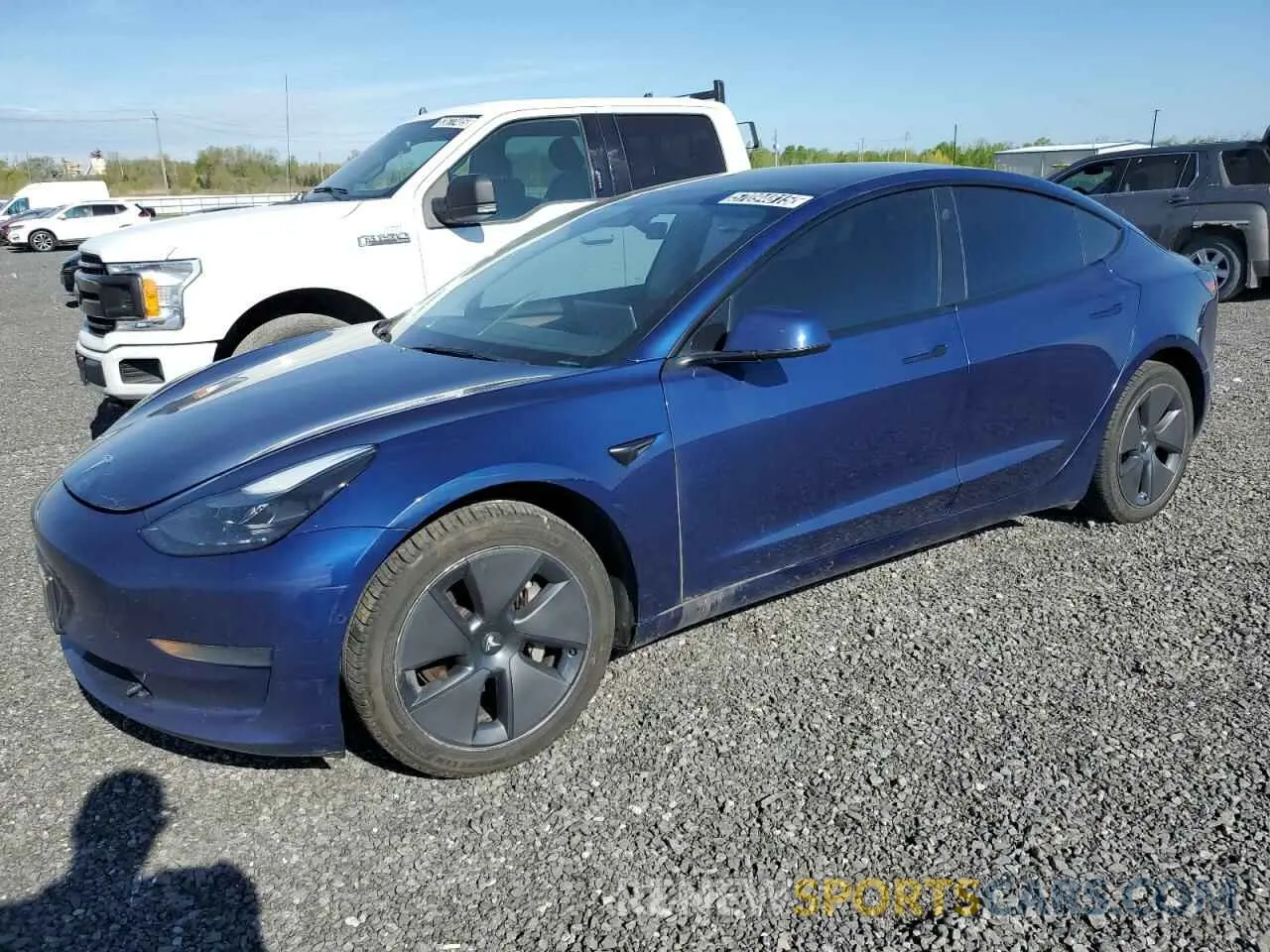 1 Photograph of a damaged car 5YJ3E1EAXNF202598 TESLA MODEL 3 2022