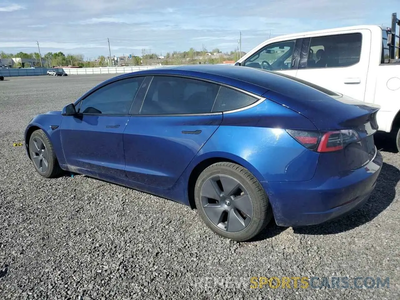 2 Photograph of a damaged car 5YJ3E1EAXNF202598 TESLA MODEL 3 2022