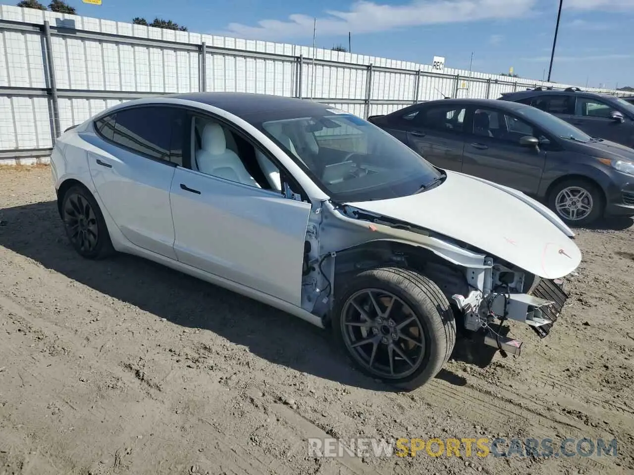 4 Photograph of a damaged car 5YJ3E1EAXNF331294 TESLA MODEL 3 2022