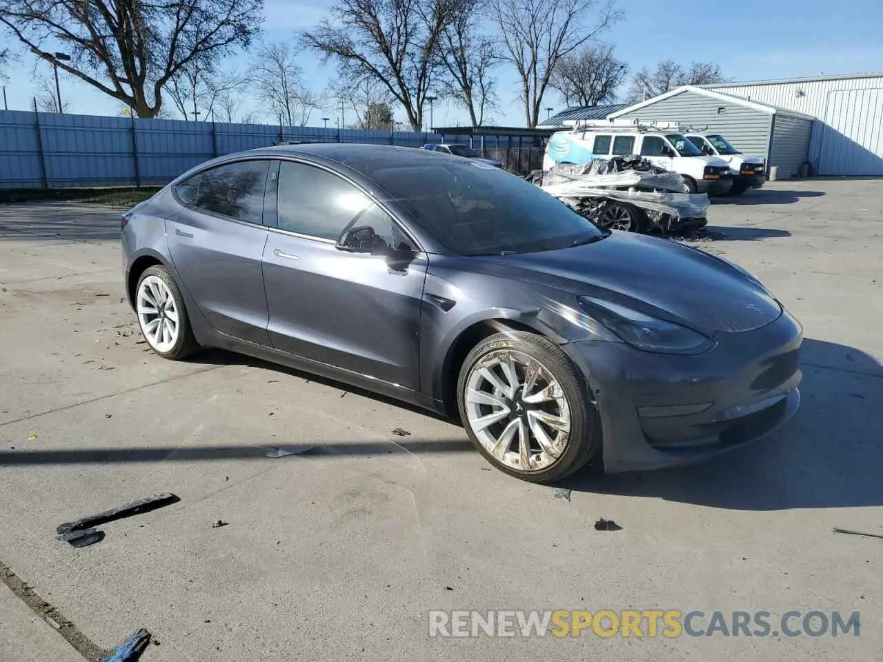 4 Photograph of a damaged car 5YJ3E1EAXNF360200 TESLA MODEL 3 2022