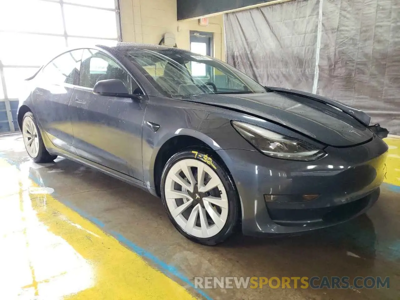4 Photograph of a damaged car 5YJ3E1EAXNF370967 TESLA MODEL 3 2022