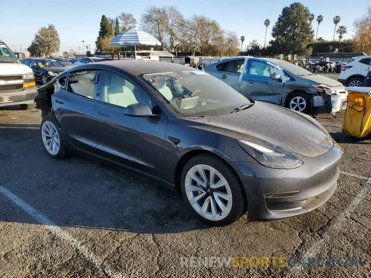 4 Фотография поврежденного автомобиля 5YJ3E1EAXNF374601 TESLA MODEL 3 2022