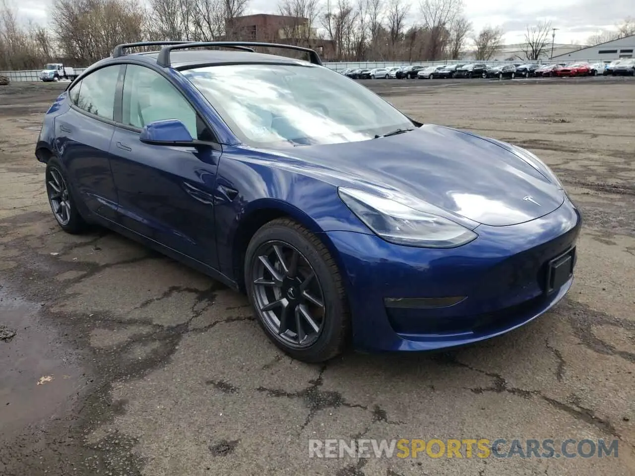 4 Фотография поврежденного автомобиля 5YJ3E1EB0NF104060 TESLA MODEL 3 2022