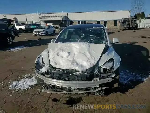 11 Photograph of a damaged car 5YJ3E1EB0NF111378 TESLA MODEL 3 2022