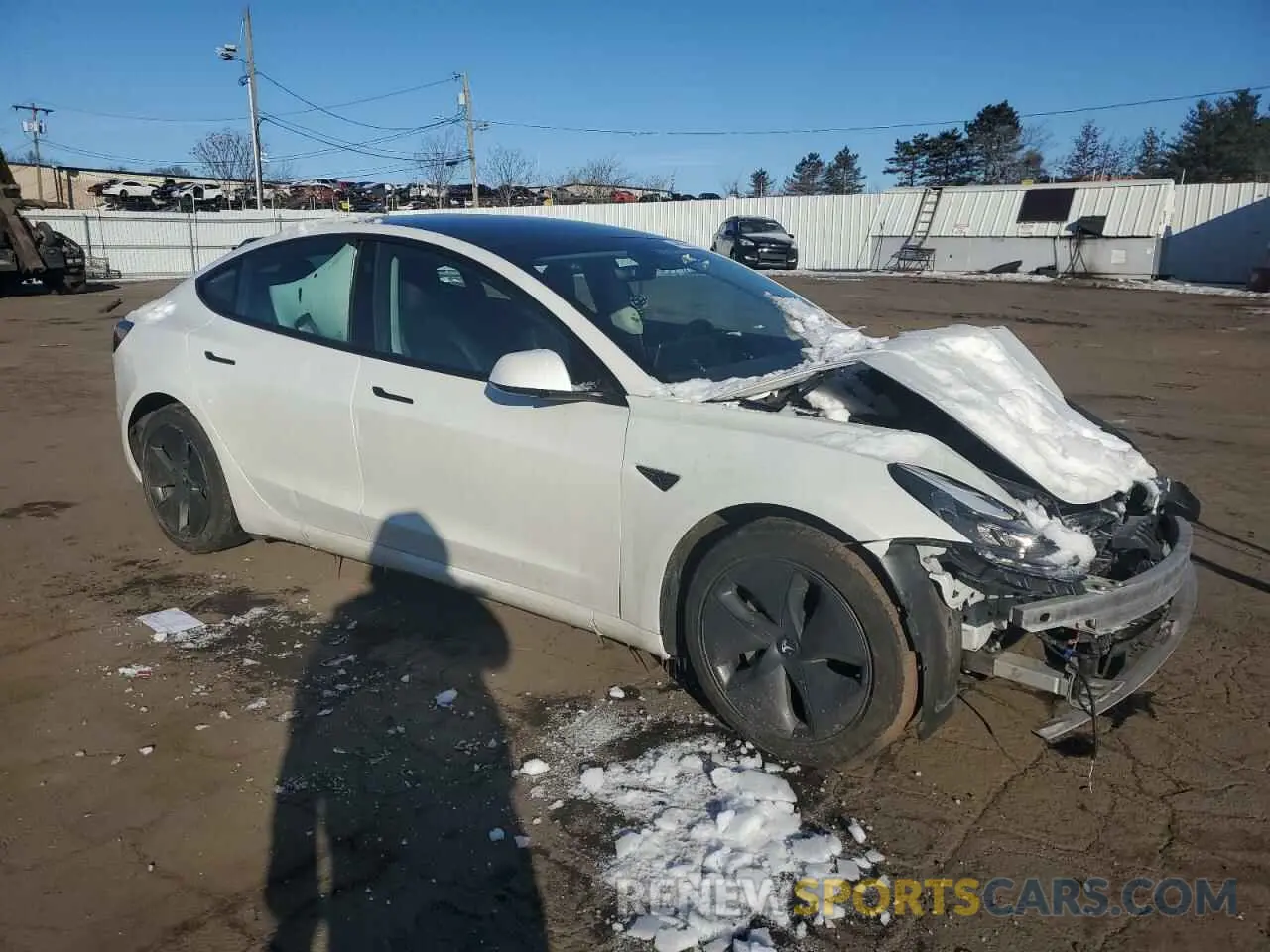 4 Photograph of a damaged car 5YJ3E1EB0NF111378 TESLA MODEL 3 2022