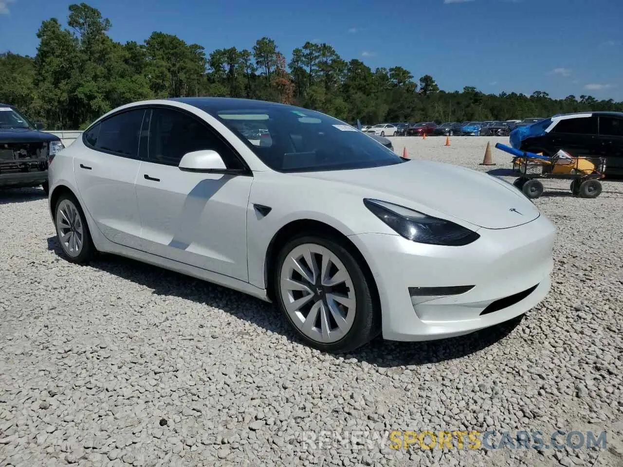 4 Фотография поврежденного автомобиля 5YJ3E1EB0NF129315 TESLA MODEL 3 2022