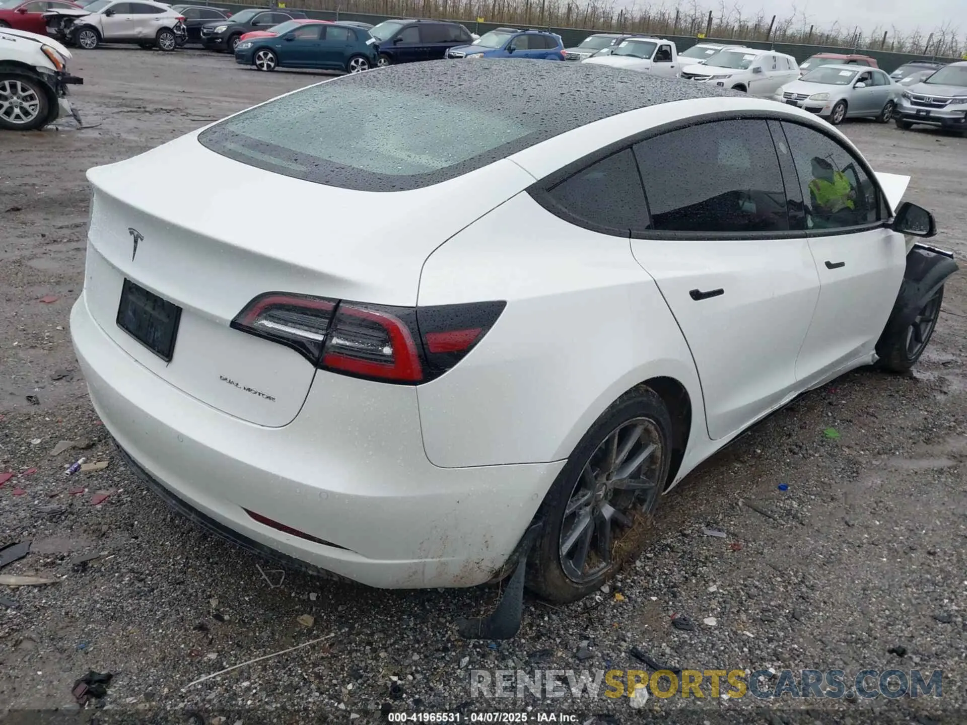 4 Photograph of a damaged car 5YJ3E1EB0NF129945 TESLA MODEL 3 2022