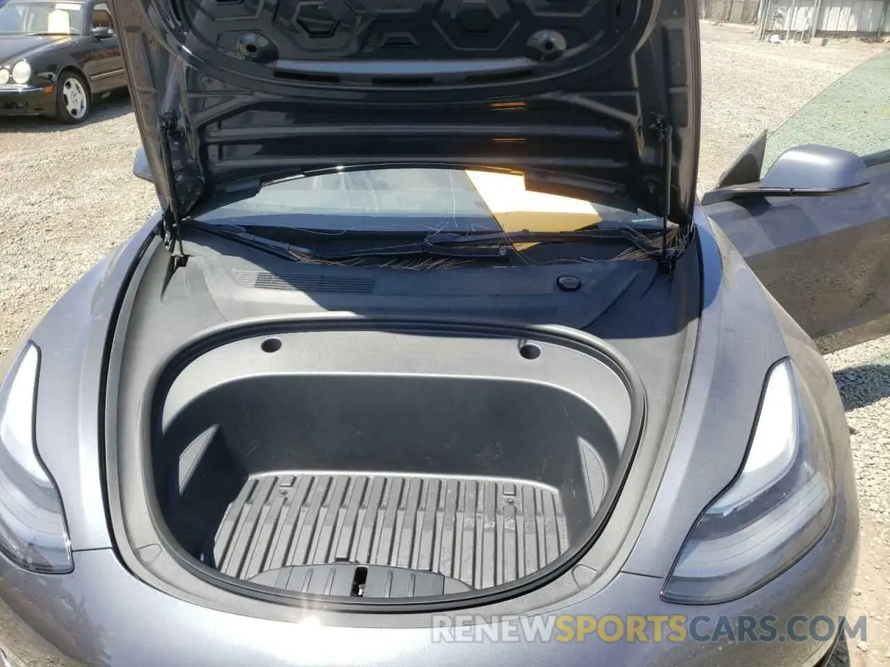 7 Photograph of a damaged car 5YJ3E1EB0NF144431 TESLA MODEL 3 2022