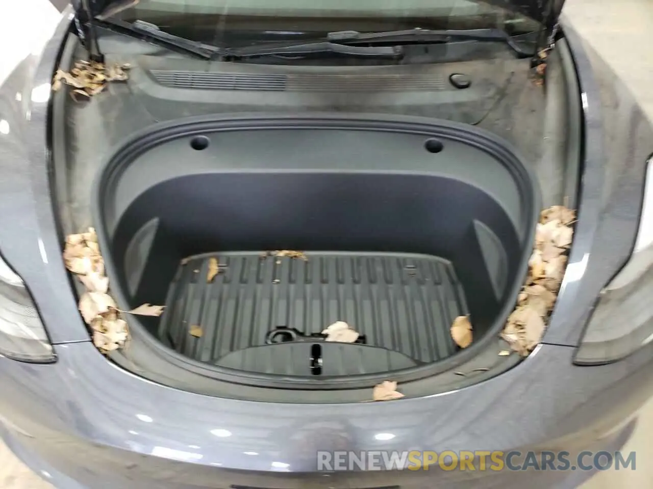 11 Photograph of a damaged car 5YJ3E1EB0NF163674 TESLA MODEL 3 2022