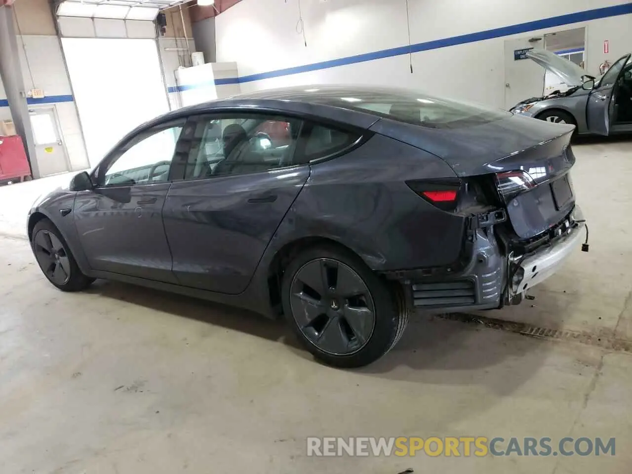 2 Photograph of a damaged car 5YJ3E1EB0NF163674 TESLA MODEL 3 2022