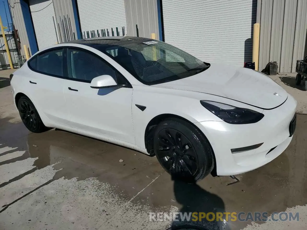 4 Photograph of a damaged car 5YJ3E1EB0NF243122 TESLA MODEL 3 2022