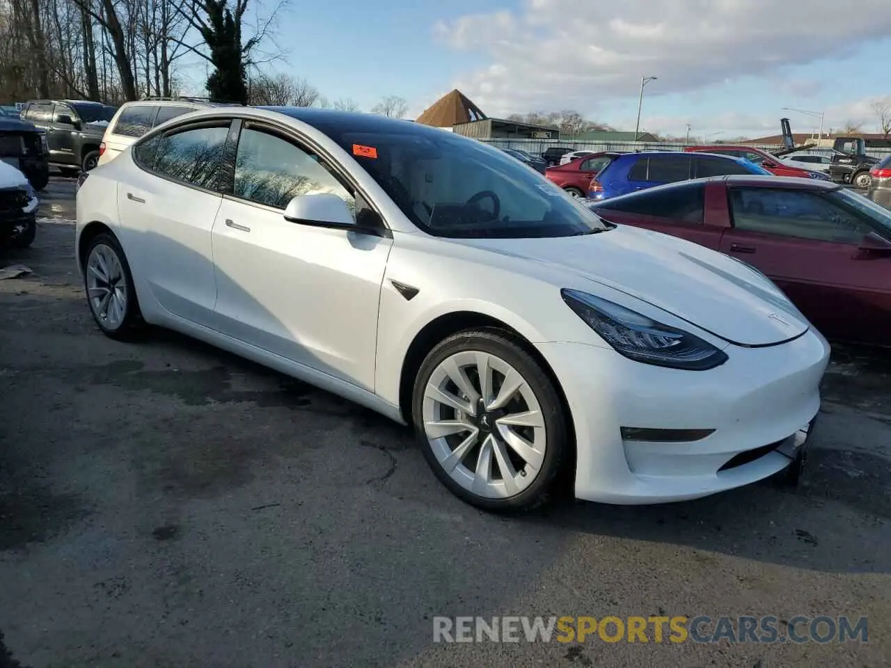 4 Photograph of a damaged car 5YJ3E1EB0NF260809 TESLA MODEL 3 2022