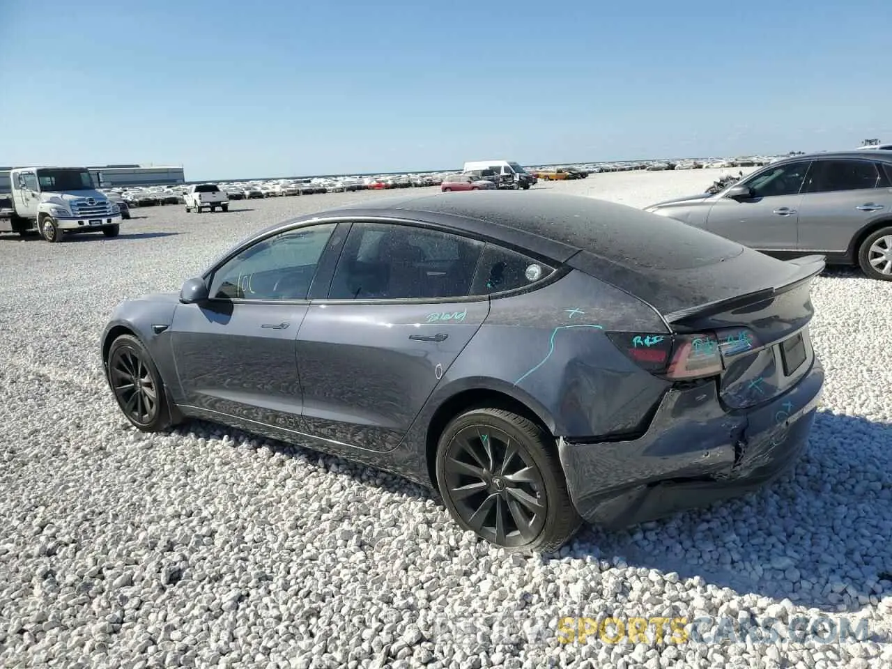 2 Photograph of a damaged car 5YJ3E1EB0NF300466 TESLA MODEL 3 2022
