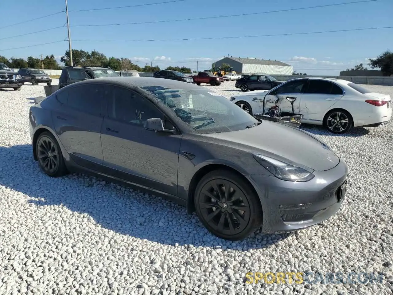 4 Photograph of a damaged car 5YJ3E1EB0NF300466 TESLA MODEL 3 2022