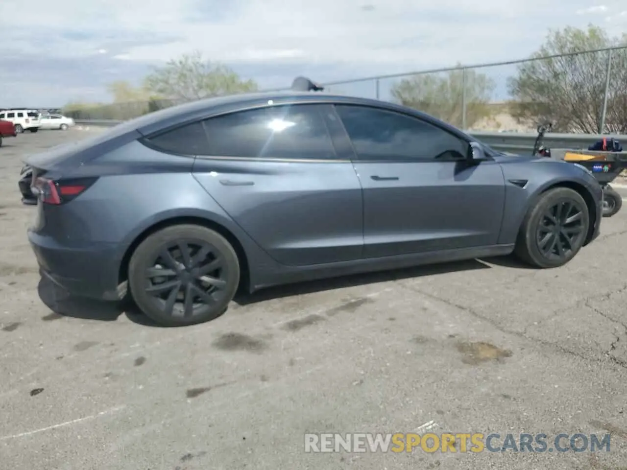 3 Photograph of a damaged car 5YJ3E1EB0NF329143 TESLA MODEL 3 2022