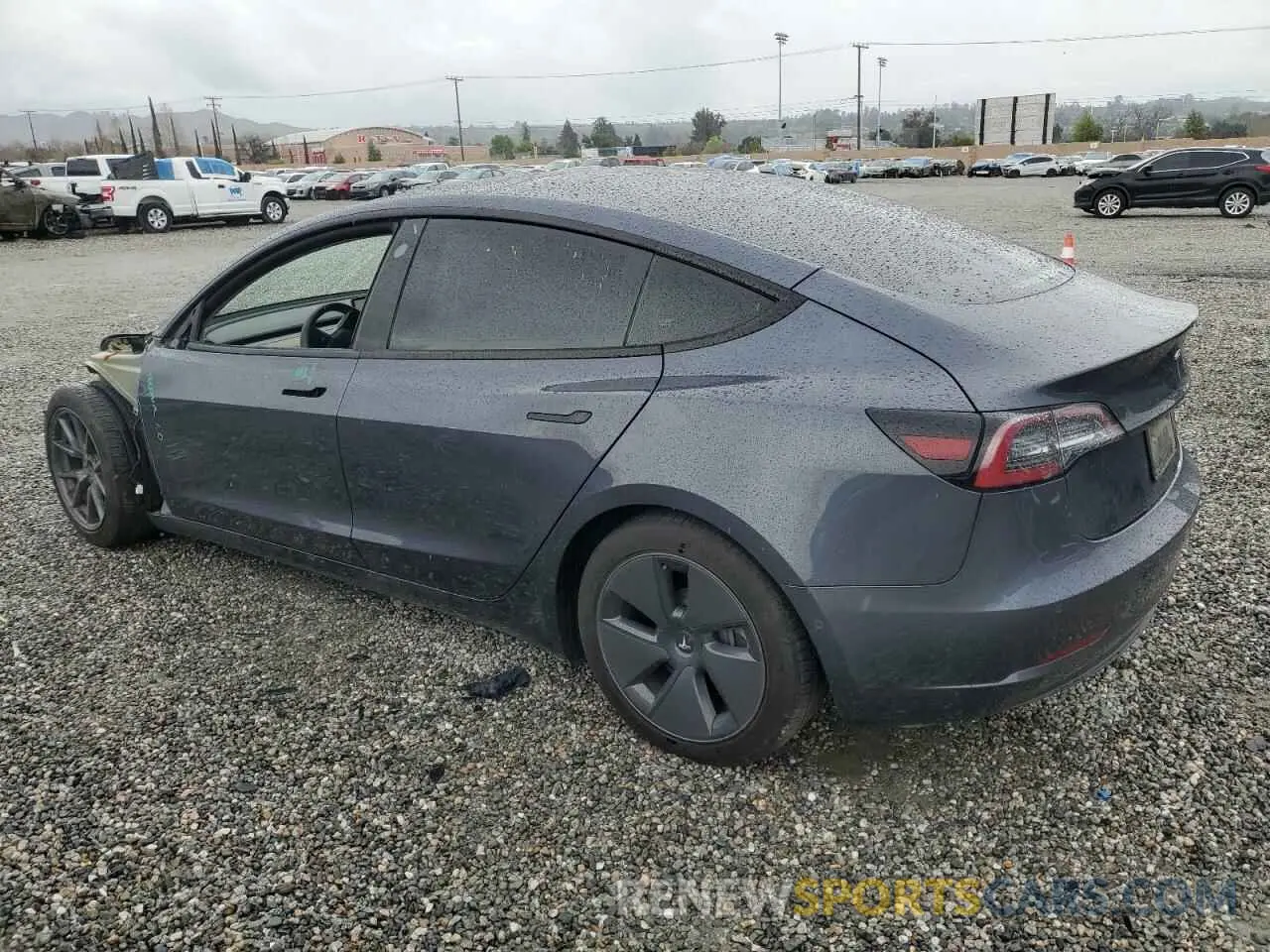 2 Photograph of a damaged car 5YJ3E1EB1NF112040 TESLA MODEL 3 2022