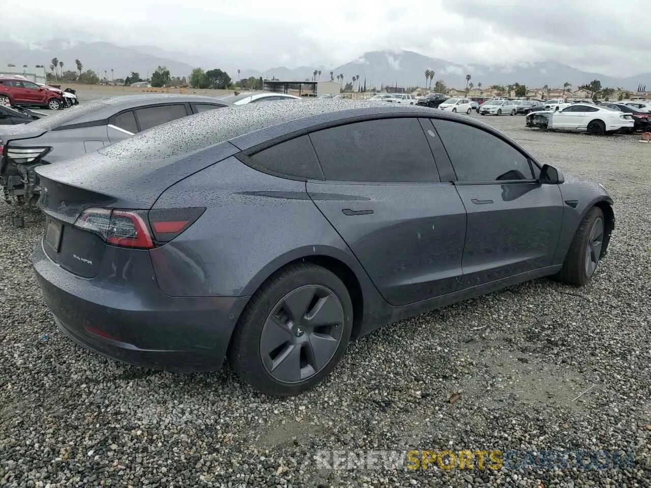 3 Photograph of a damaged car 5YJ3E1EB1NF112040 TESLA MODEL 3 2022